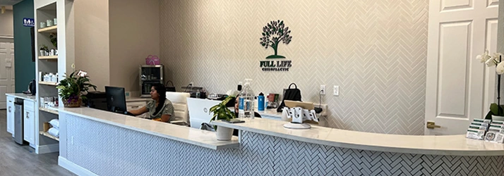 Chiropractic Lutz FL Front Desk Staff At Reception