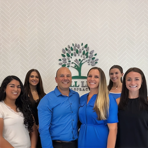 Chiropractor Lutz FL Crystal Corona, Enrico Dolcecore, Christine Hafer, and Alexis Miller With Team