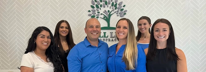 Chiropractor Lutz FL Crystal Corona, Enrico Dolcecore, Christine Hafer, and Alexis Miller With Team